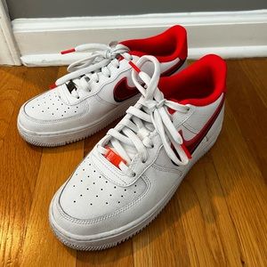 Nike Air Forces with Pink Swoosh